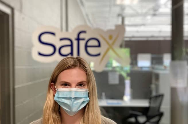 Safex employee in mask